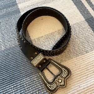 Belt w/ a cowboy buckle